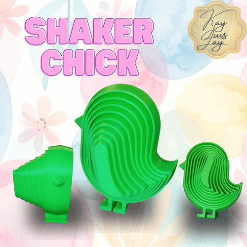 Green shaker chick toy with 'Shaker Chick' text and brand logo on a colorful background